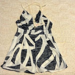 BRAND NEW, NEVER WORN romper from American Threads. Tags attached.